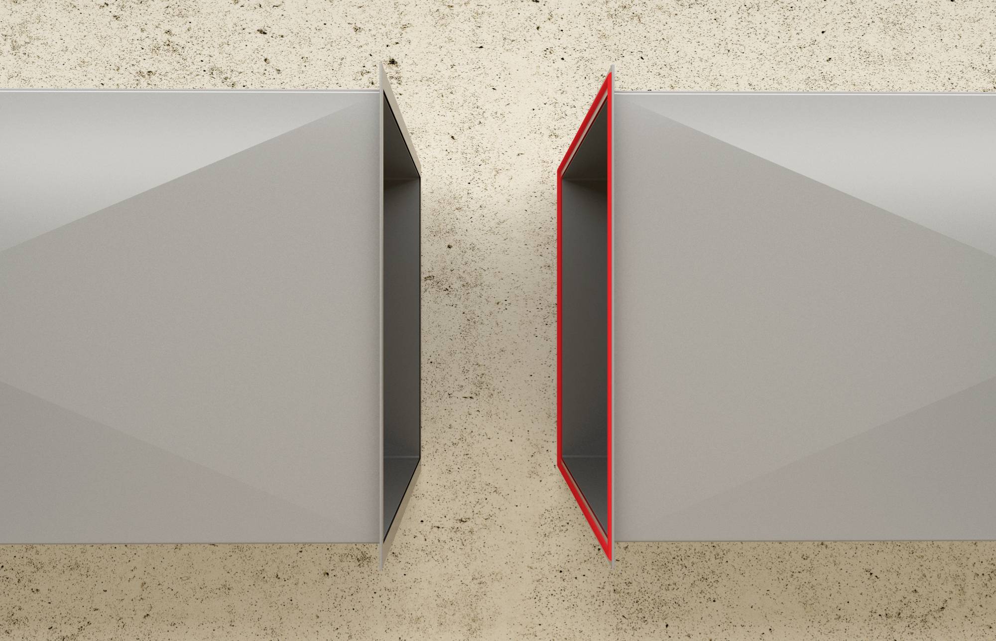 Zwei graue quadratische Objekte an einer Betonwand, eins vorne geöffnet, das linke objekt hat einen roten Rahmen um die Öffnung.
