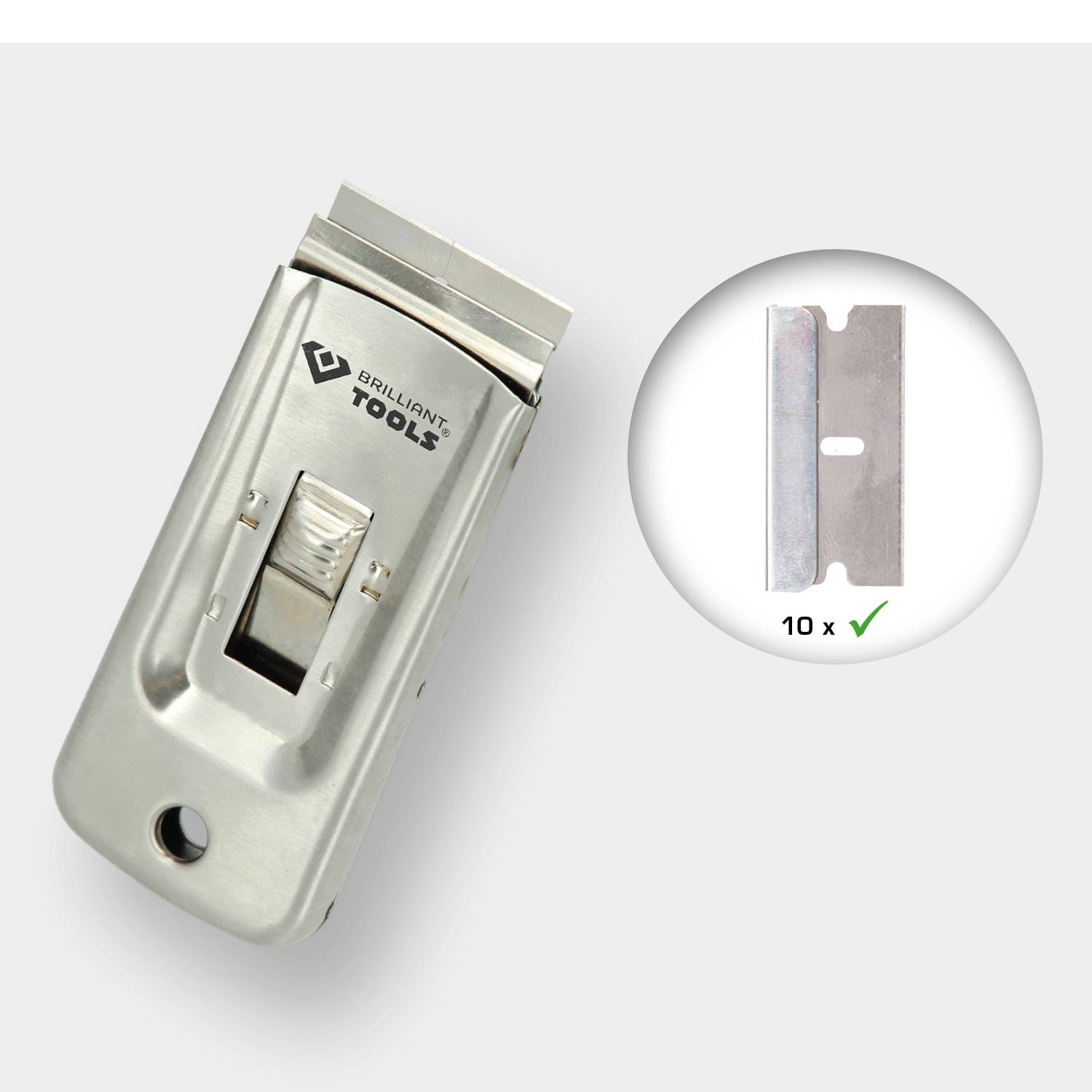 Silberner Glasschaber mit einer Klinge, daneben ein Kreis, der zehn Ersatzklingen und ein Häkchen zeigt. Markierung 'Tools'.