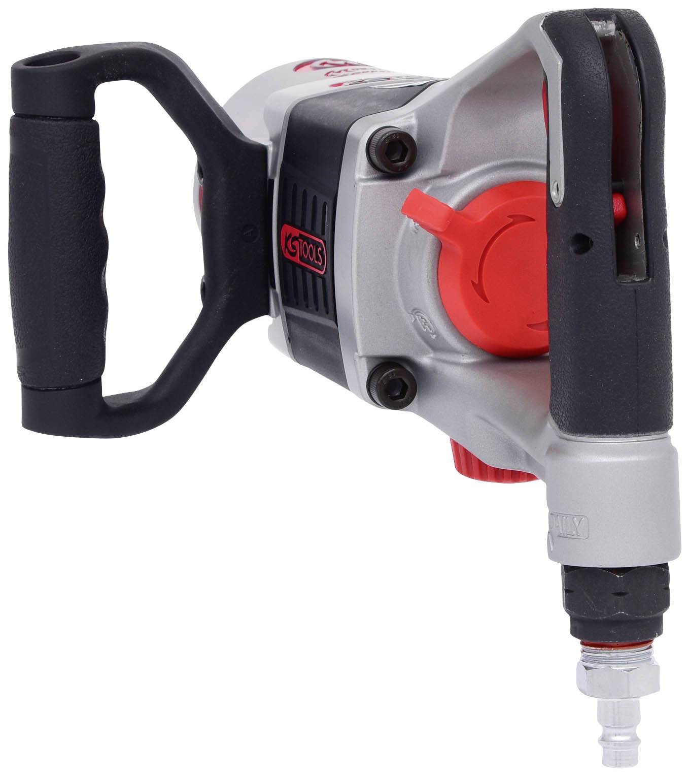 Ein elektrischer Bohrhammer mit rotem und schwarzem Gehäuse, großem Griff und Anschluss für Luftkompressor.