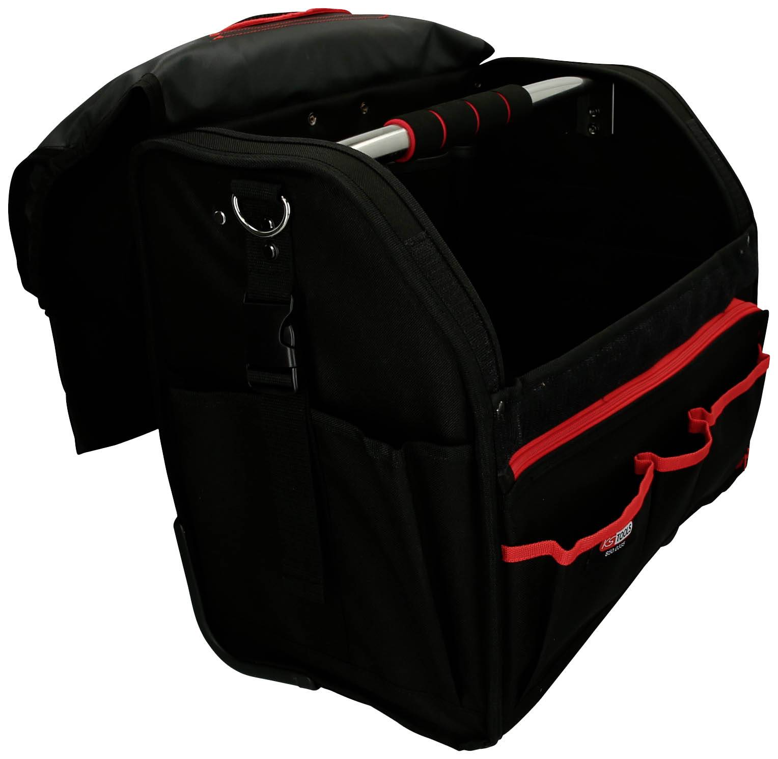Große schwarze Werkzeugtasche mit roten Details, offenstehend. Mehrere Fächer und ein Tragegriff sichtbar. Geeignet für Werkzeuge.