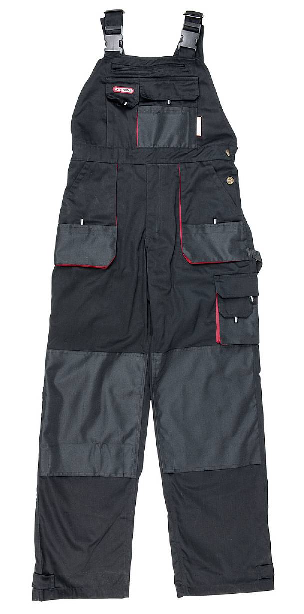 Schwarze Latzhose mit mehreren Taschen und rotem Rand. Geeignet für handwerkliche Arbeiten oder Outdoor-Aktivitäten.
