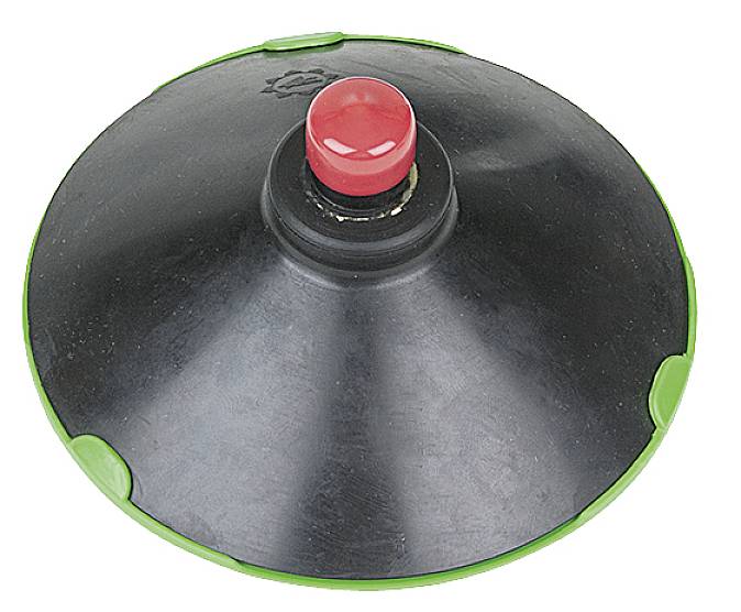 Ein runder, schwarzer und grüner Wackel-Rotor mit einem roten Knopf in der Mitte. Das Gerät dient dem Gleichgewichtstraining.