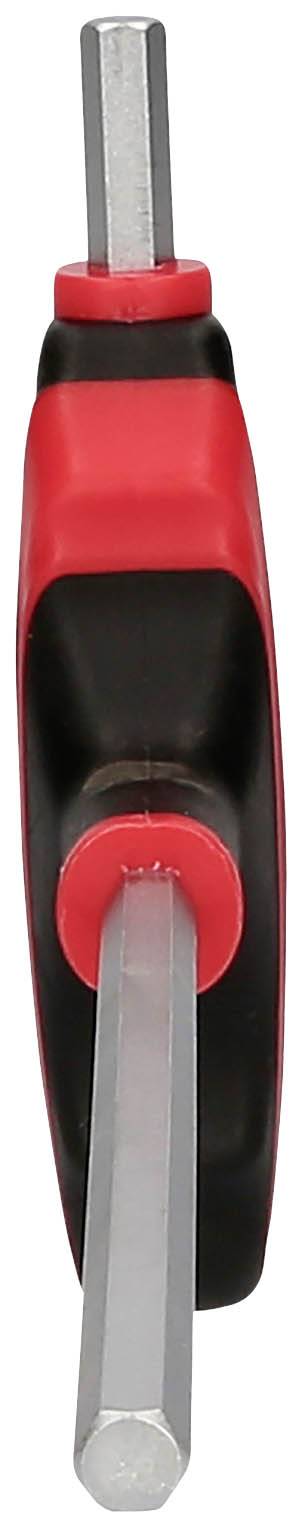 Ein Inbusschlüssel mit rotem und schwarzem Griff, in Nahaufnahme von oben fotografiert.