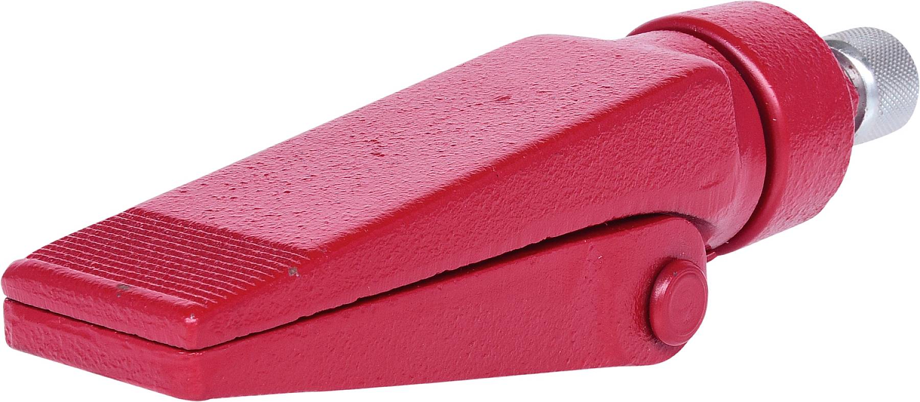 Ein roter Keilspanner aus Metall mit geripptem Griff und runder Basis, verwendet zur Befestigung oder Sicherung von Werkstücken.
