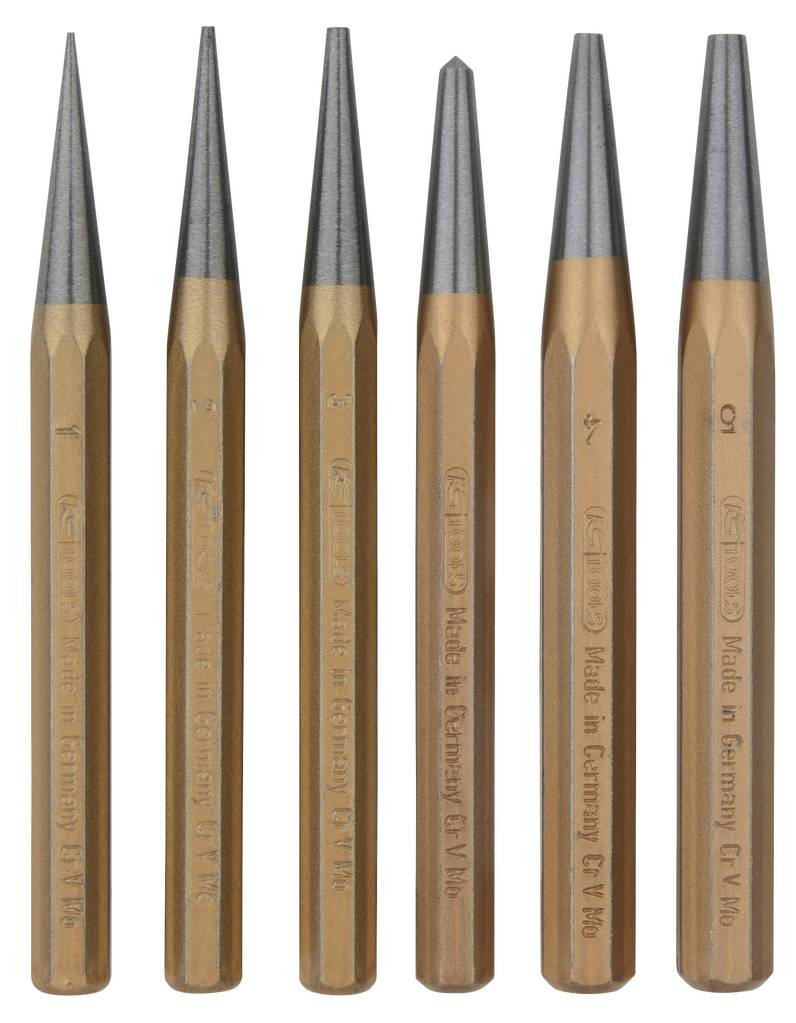 Sechs konische Metallstifte in einer Reihe, aus braunem und grauem Material, mit Gravuren 'Made in Germany'.