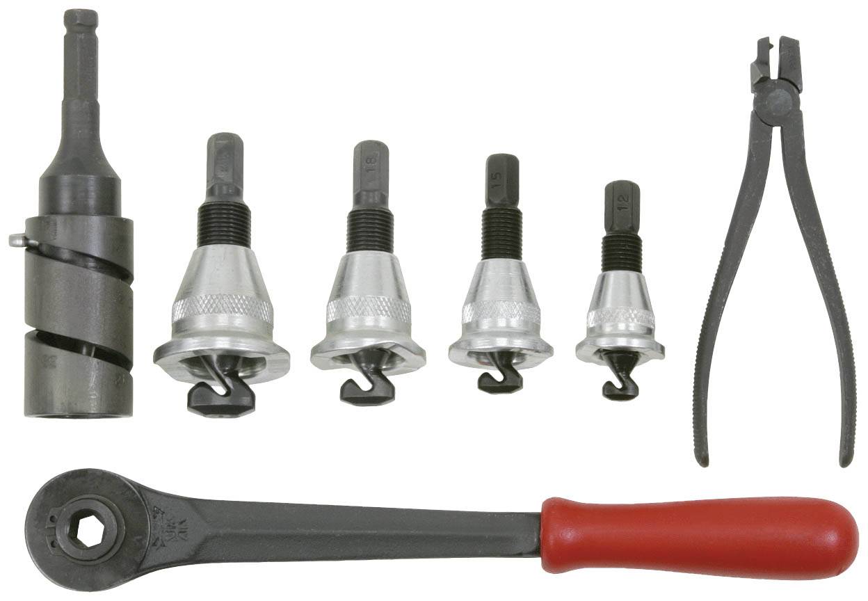 Ein Satz von Abziehwerkzeugen für das Entfernen von Traggelenken, einschließlich Ratsche, Abziehstücken und Zange.