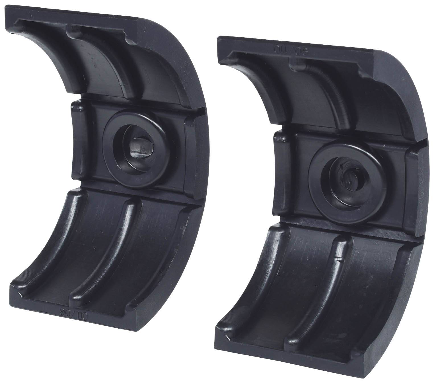 Zwei schwarze Halbschalen, die als Lager verwendet werden können, mit inneren Rillen und zylindrischen Mittelteilen.