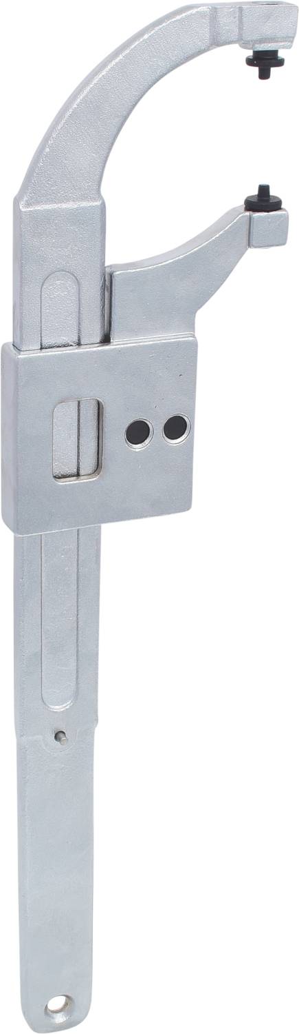 Silberner Hakenschlüssel mit verstellbarem Kopf, häufig genutzt für Schraubverbindungen in Maschinen oder Fahrzeugen.