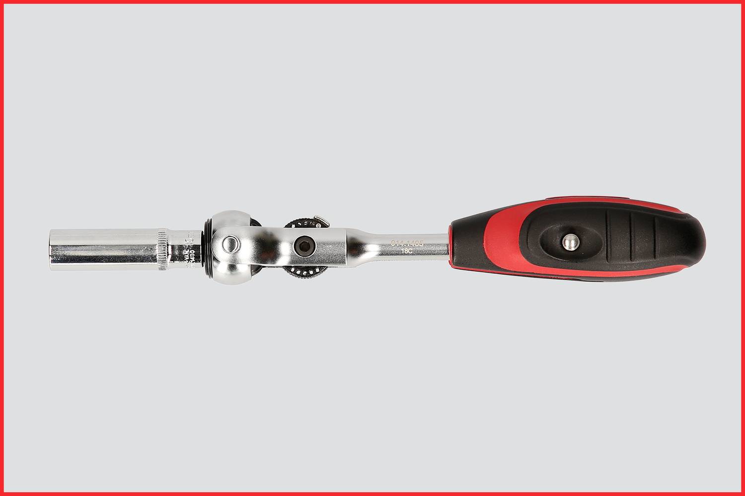 Ratsche mit schwarzem und rotem Griff, aus Metall, horizontal gelegen, auf grauem Hintergrund.