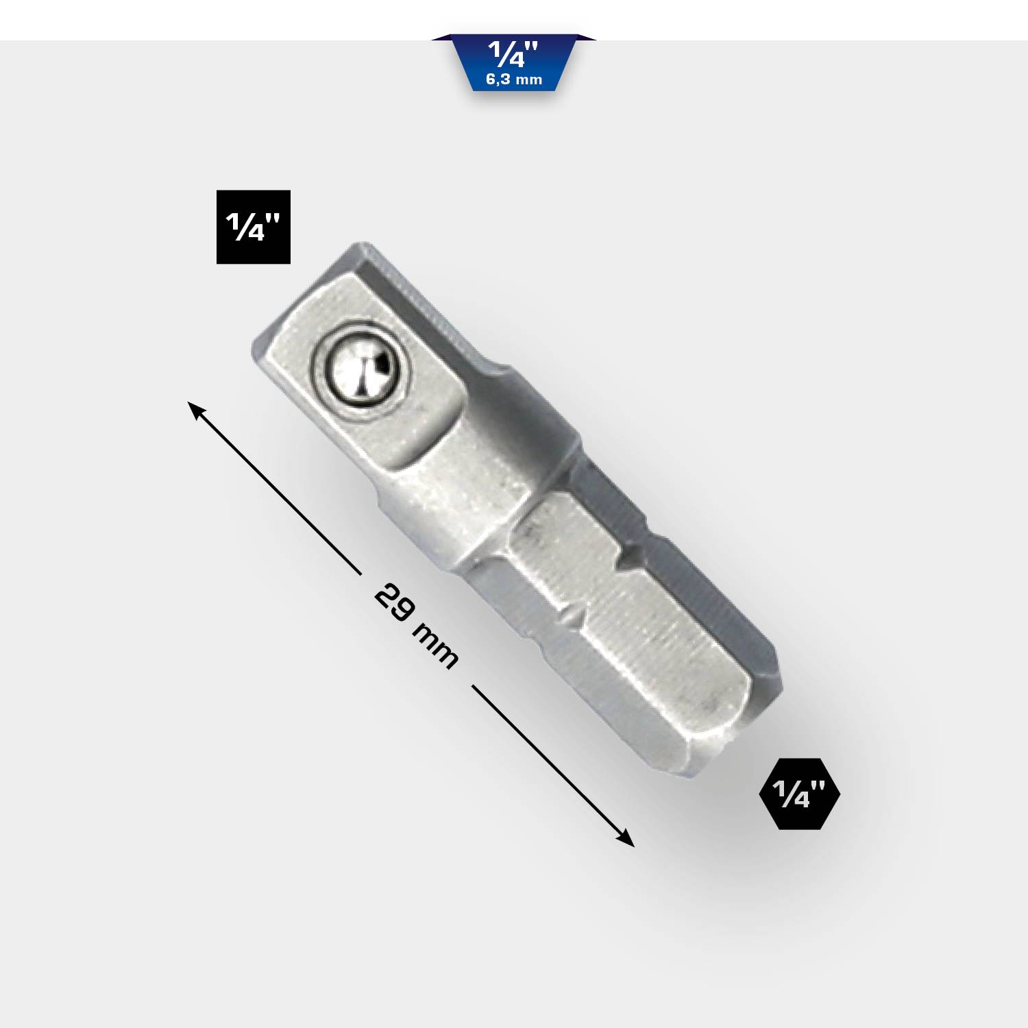 Ein silberner Adapter mit 1/4 Zoll Aufsatz und 29 mm Länge. Markierungen zeigen Größenmaße an. Geeignet für Werkzeuge.