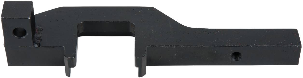 Ein Metallwerkzeug mit rechteckiger Form und Aussparungen, vermutlich zur Befestigung oder zum Ausrichten von Maschinenkomponenten.