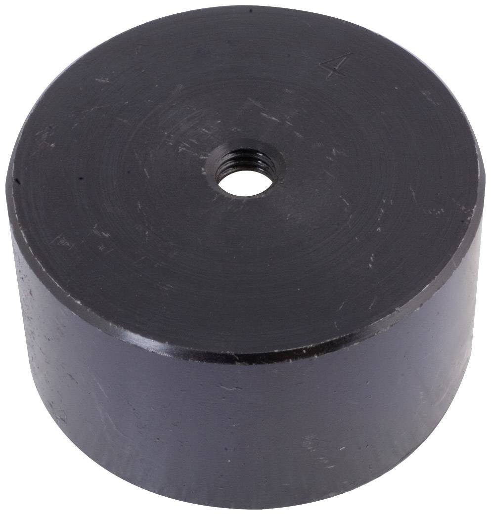 Schwarzer, runder Metallblock mit einem Loch in der Mitte, das Gewinde für Schrauben zeigt.