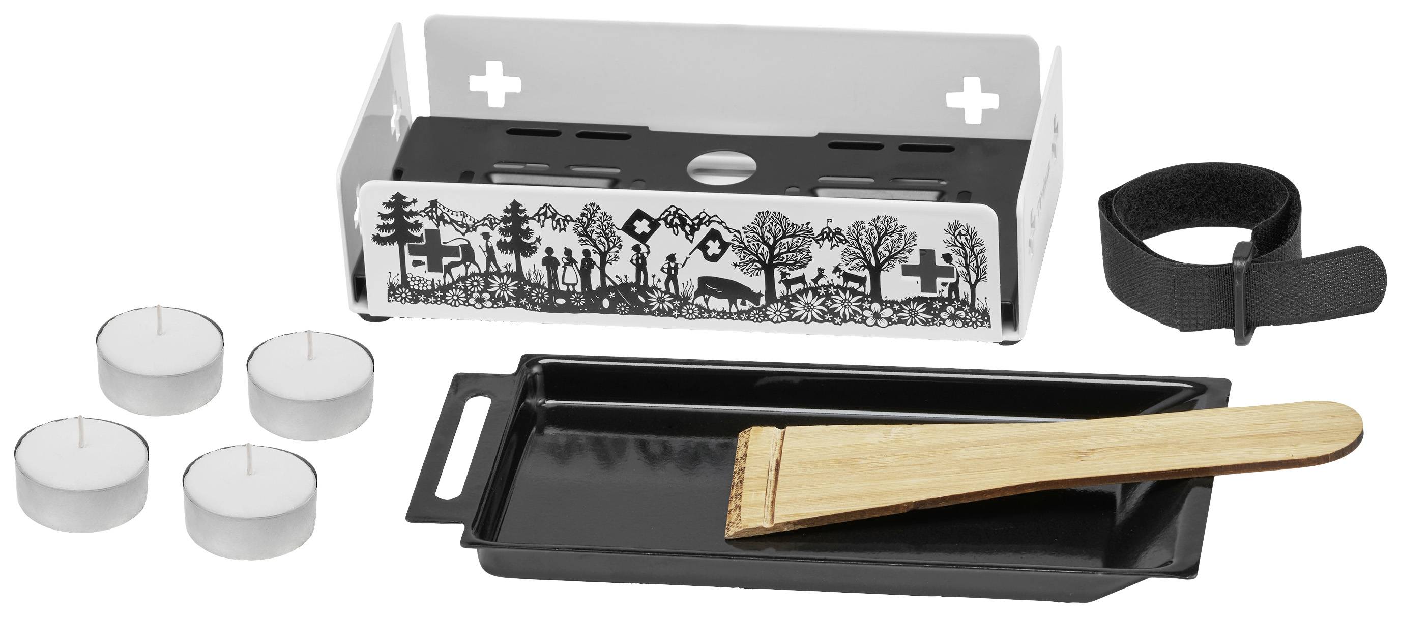 Raclette-Set mit Teelichtern, schwarzer Pfanne, Holzspatel und Gürtel. Dekoratives Alpenmotiv auf dem Brenner.