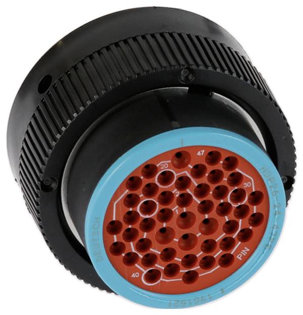 Ein zylindrischer Multi-Pin-Elektrostecker mit schwarzem Außengehäuse, roter Innenplatte und mehreren kleinen Metallstiften für Verdrahtungsverbindungen.