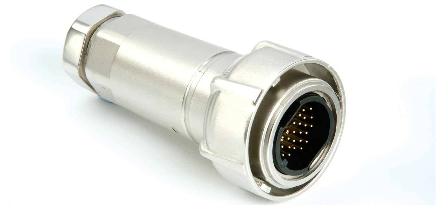 Ein metallischer zylindrischer Stecker mit mehreren Stiften, der zur Verbindung von elektronischen oder audiovisuellen Geräten verwendet wird, auf weißem Hintergrund.