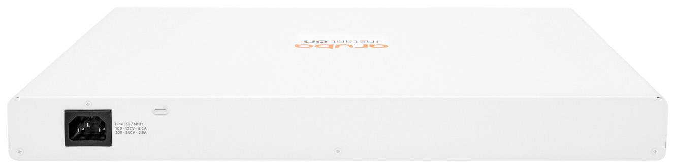 Weiße, flache elektronische Box mit einem Stromanschluss auf der linken Seite. Oberseite trägt den orangefarbenen Markennamen.