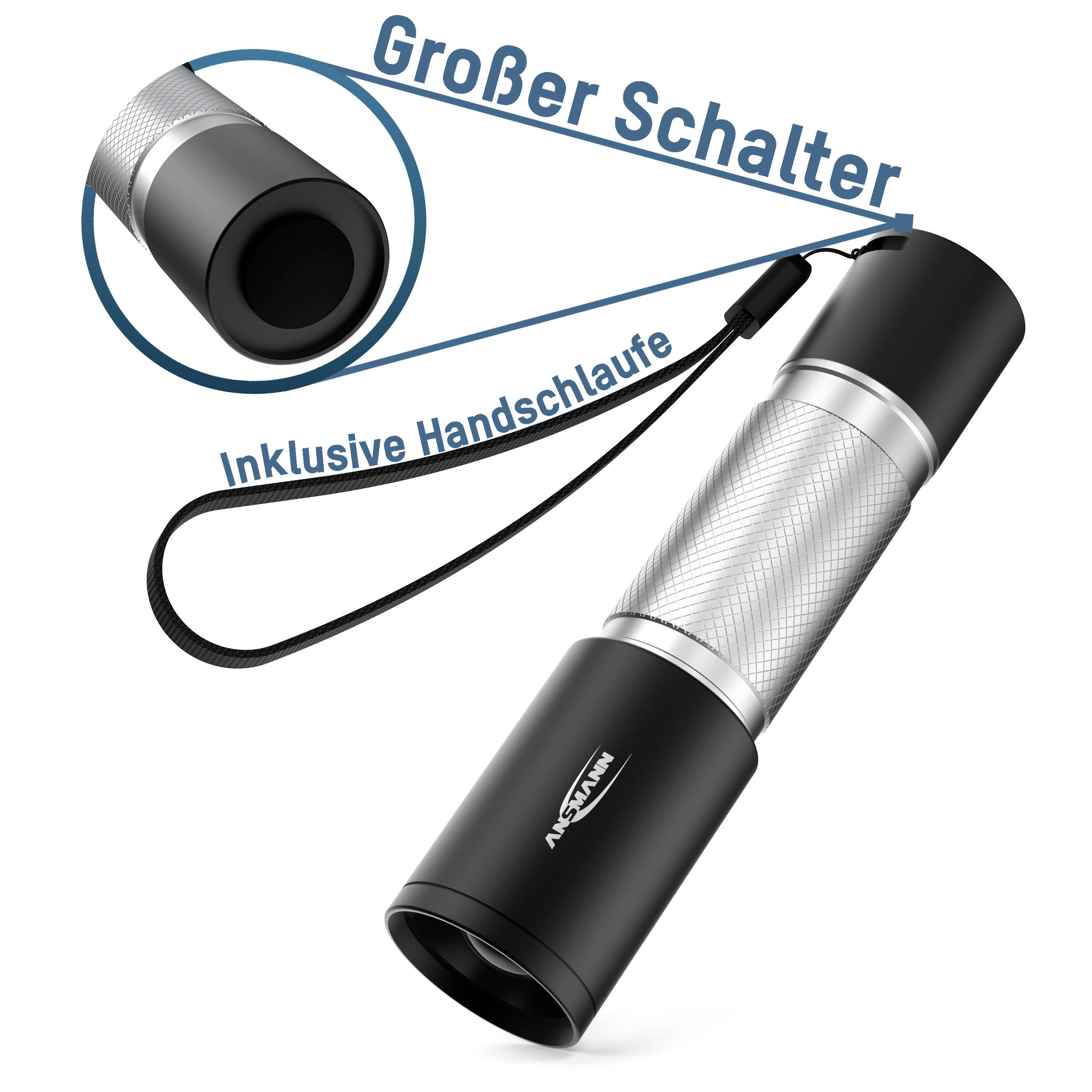Taschenlampe mit großem Schalter und Handschlaufe, silber-schwarzes Design, Text 'Inklusive Handschlaufe'.