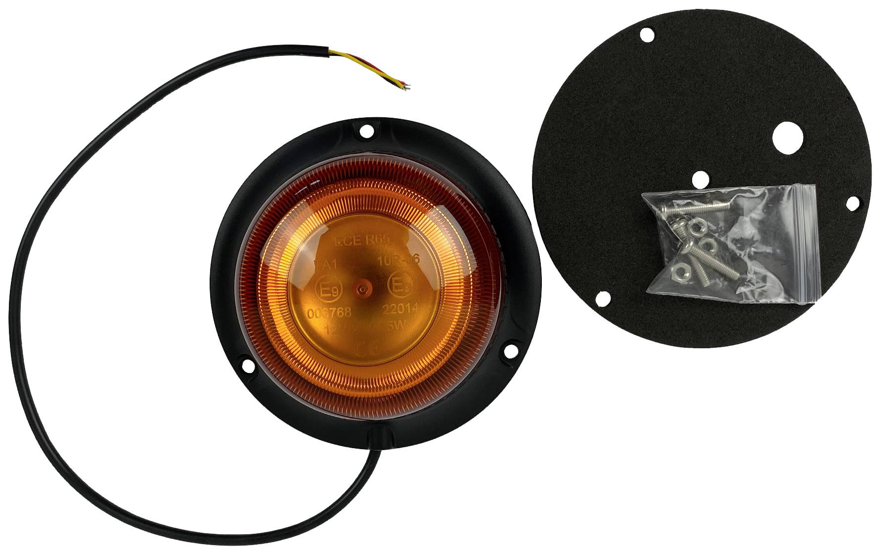 Rundes, orangenes Fahrzeugrücklicht mit Kabel, Montageplatte und Befestigungsmaterial daneben.