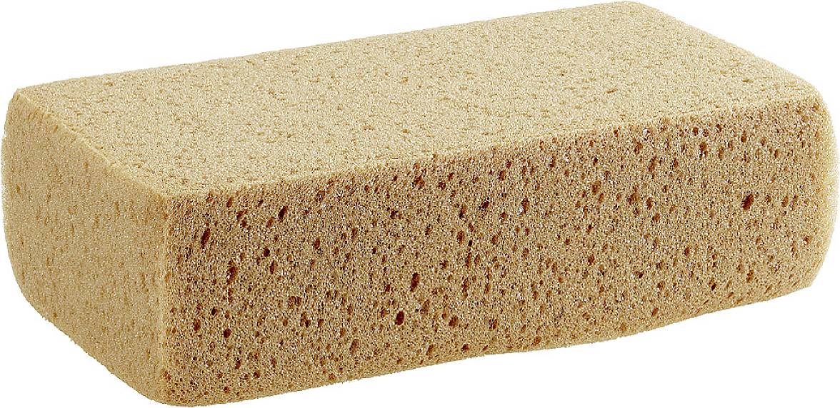 Ein rechteckiger, beige Schwamm mit gleichmäßiger poröser Struktur, liegt auf einer weißen Fläche.