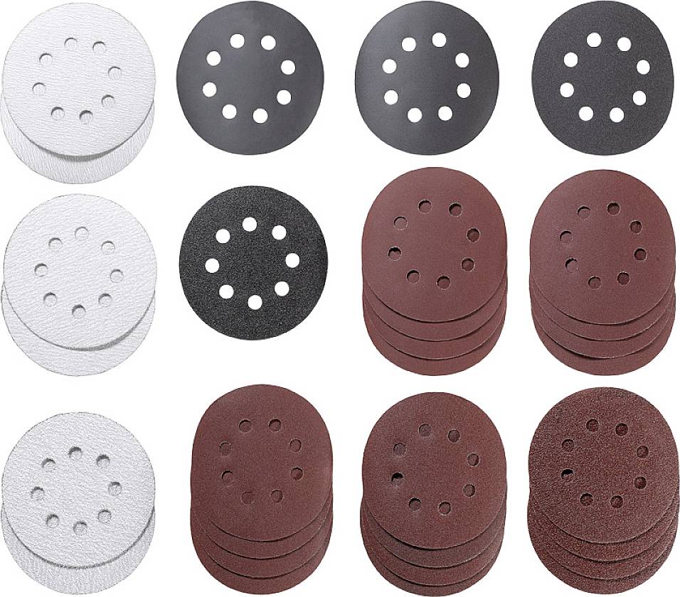 Verschiedene Schleifscheiben in weiß, schwarz und rot, mit Löchern zur Befestigung, auf einer weißen Oberfläche angeordnet.