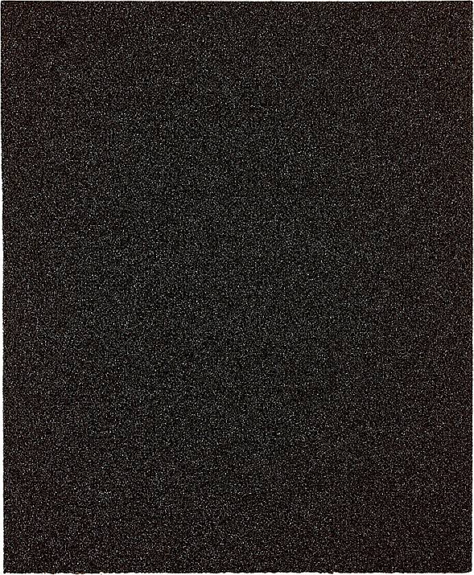 Nahaufnahme einer schwarzen, rauen Oberfläche, die an Sandpapier erinnert.