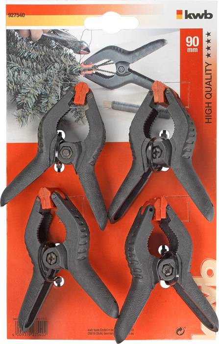 'Kwb' Verpackung mit vier schwarzen Kunststoffklemmen, je 90mm. Hintergrund zeigt eine Klemme im Gebrauch beim Befestigen von Zweigen.