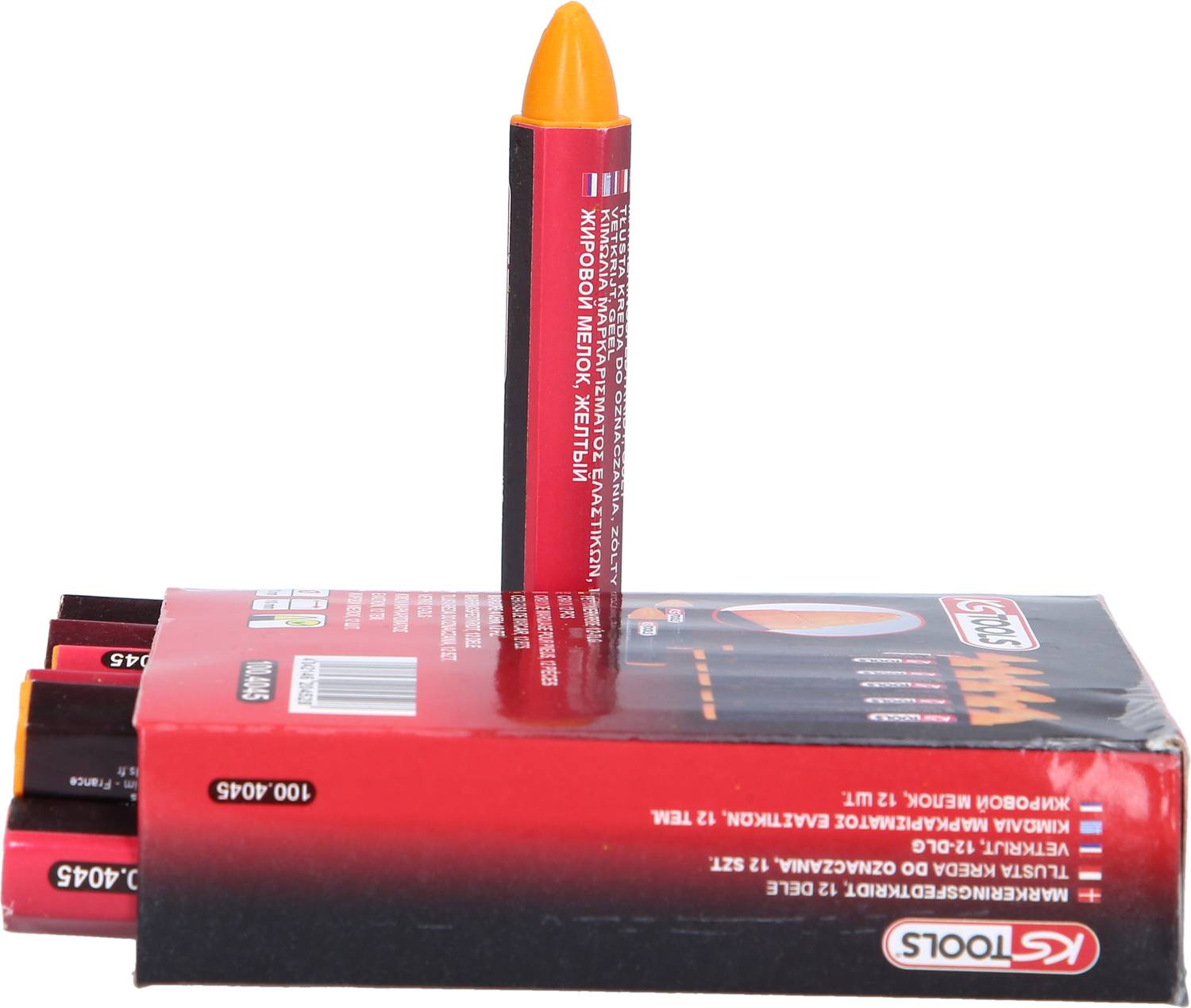 Roter Karton mit aufgedrucktem 'KTOOLS'-Logo enthält gelben Wachsmalstift. Einer steht aufrecht aus der Schachtel heraus.