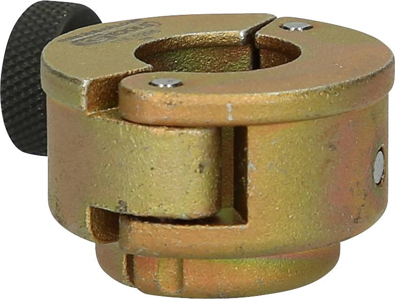 Messingfarbene Metallklemme mit schwarzer Schraube, verwendet zur Befestigung oder Verbindung von Geräten oder Kabeln.