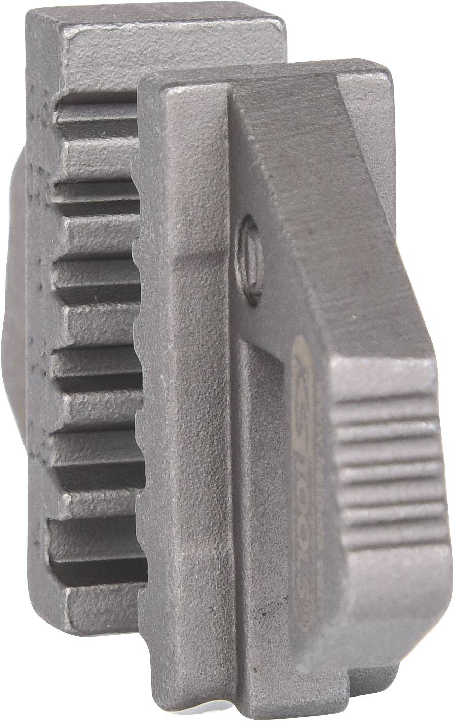 Ein silbernes Metallwerkzeug mit gezahnter Oberfläche. Es scheint für das Klemmen oder Greifen von Materialien entworfen zu sein.