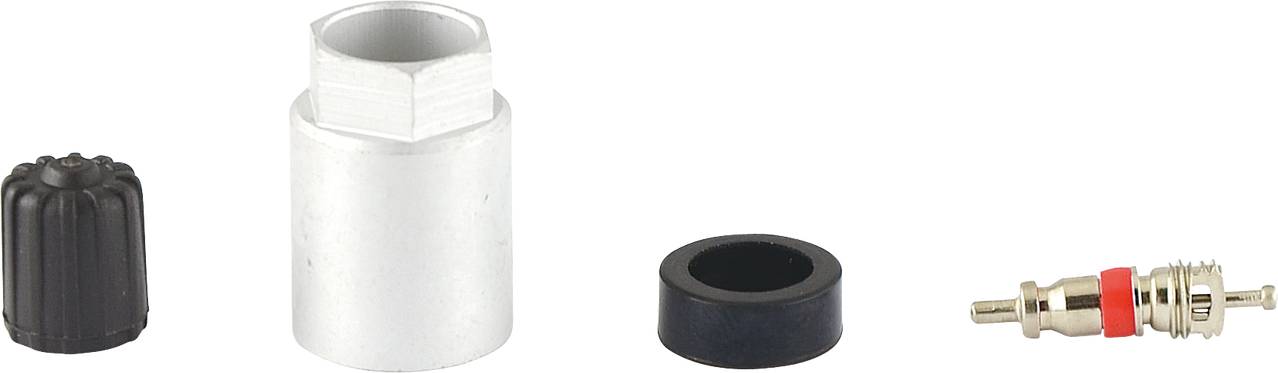 Vier Fahrradventilteile nebeneinander: Eine schwarze Kappe, ein silberner Adapter, ein schwarzer Dichtungsring und ein Ventileinsatz.