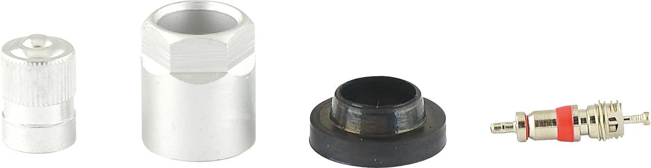Vier Autoreifenventil-Komponenten nebeneinander: Kappe, Metallhülse, Gummidichtung, Ventileinsatz.