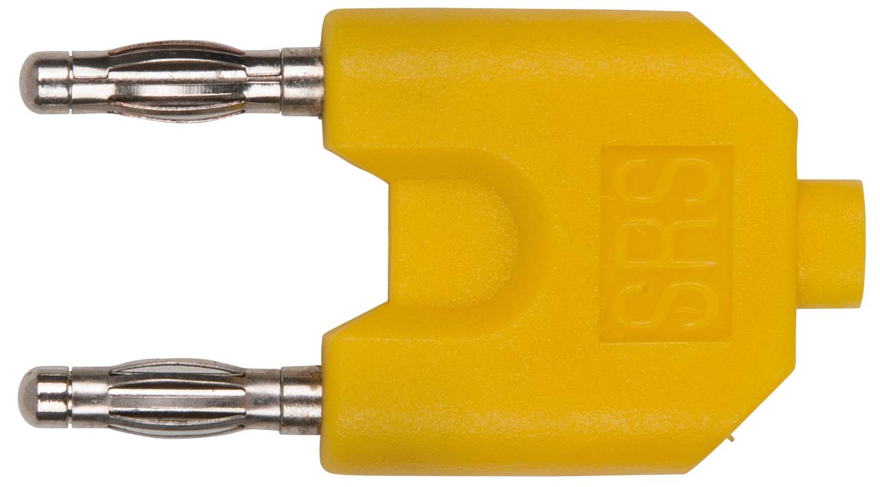 Ein gelber Multimeter-Adapter mit zwei Metallsteckern.