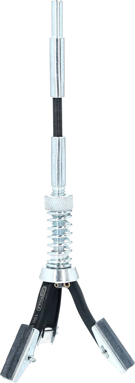 Metallische Antennenhalterung mit doppeltem Stab und Spiralfeder in der Mitte, montiert auf einem dreifüßigen Ständer.