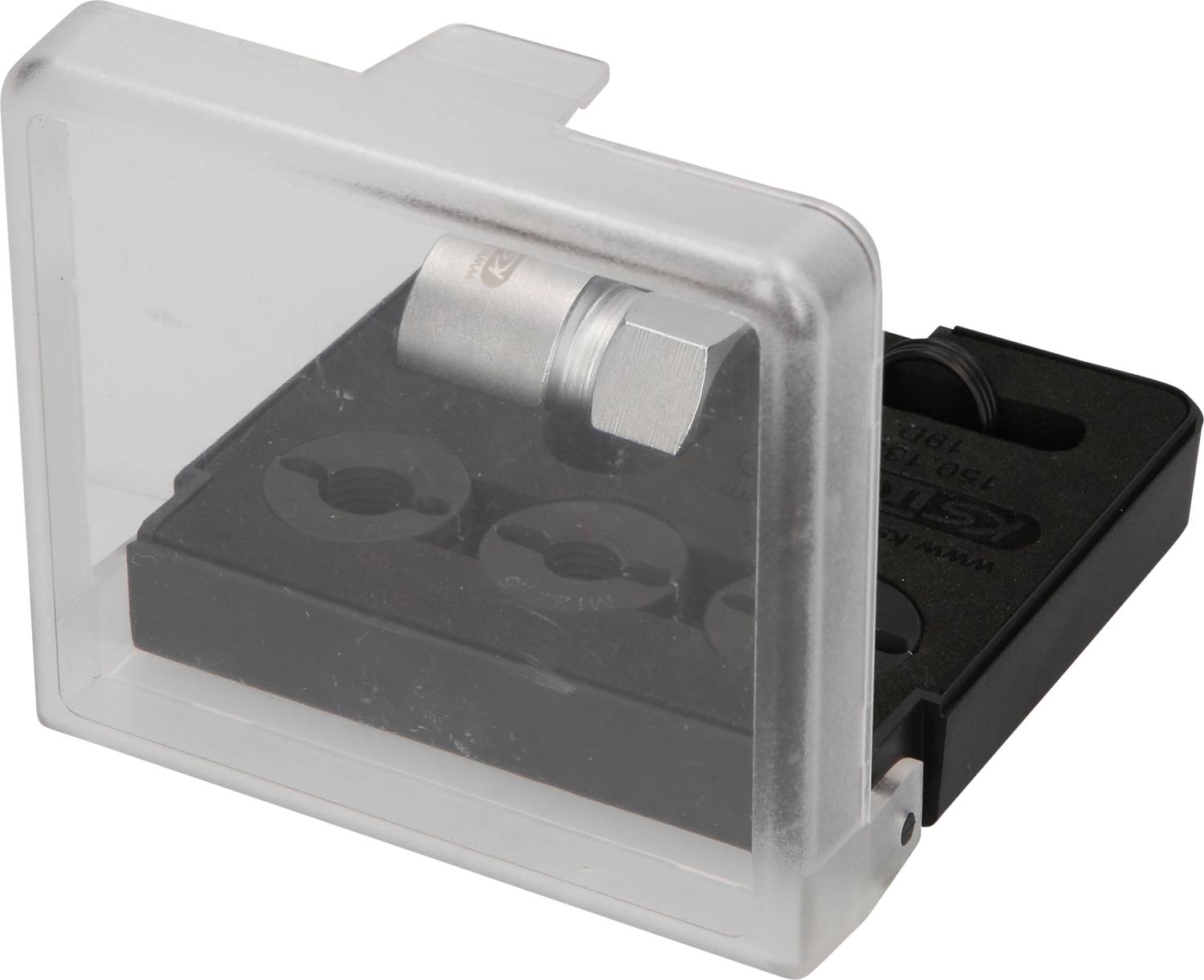 Das Bild zeigt eine transparente Kunststoffbox mit schwarzem Einsatz, die vier Rundteile und einen silbernen Metallzylinder enthält.