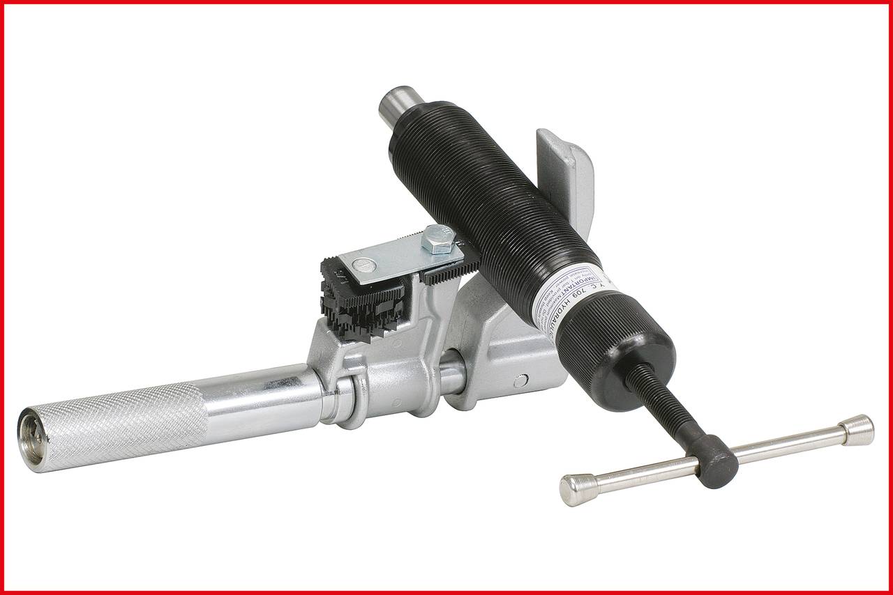 Ein Bremssattelrücksteller-Werkzeug aus Metall mit gerändeltem Griff und Ratschenmechanismus, verwendet zur Wartung von Bremssystemen.