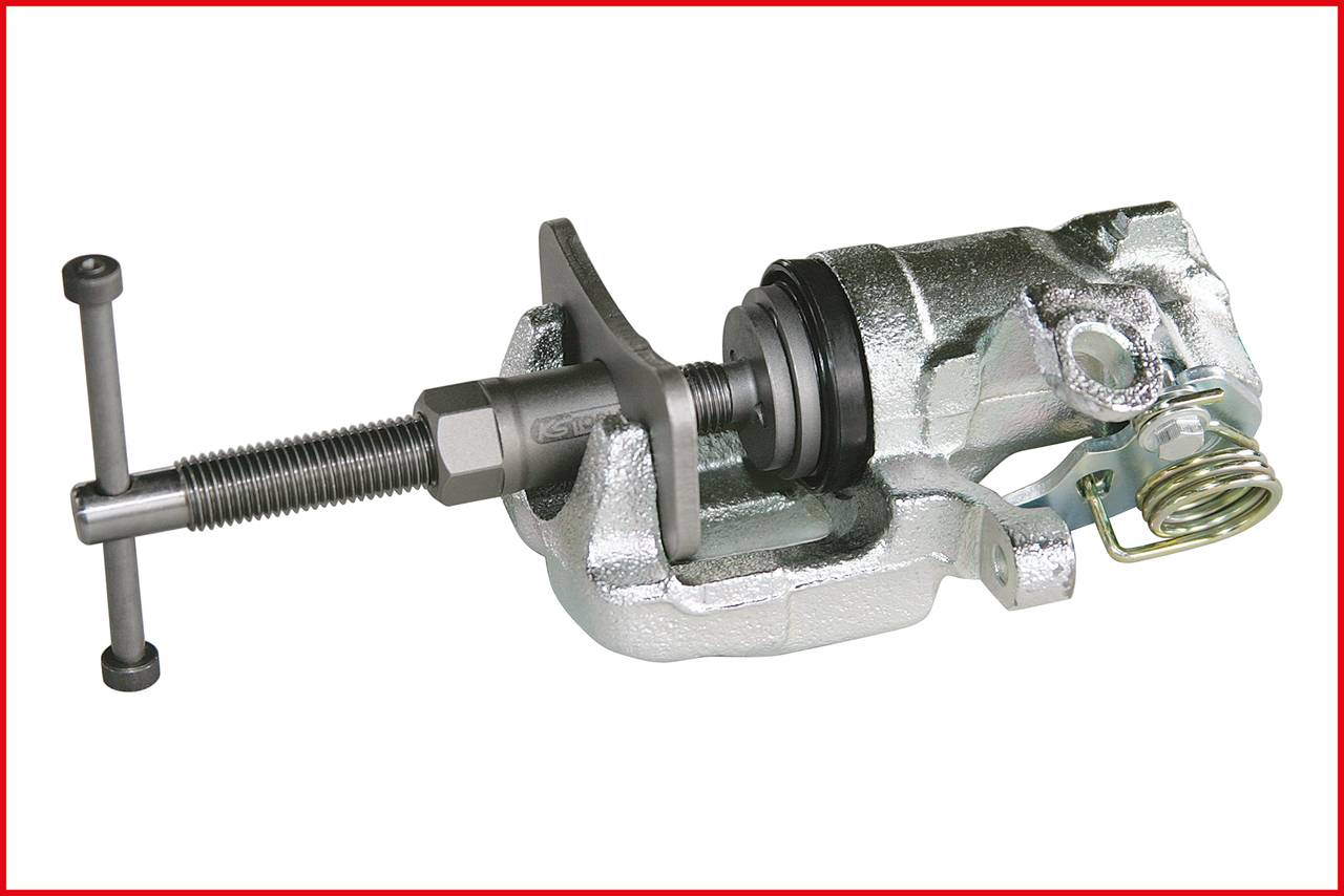 Silberne Bremskolben-Rückstellvorrichtung mit Schraubmechanismus, Feder und T-Griff. Wird verwendet, um Bremssättel zurückzusetzen.
