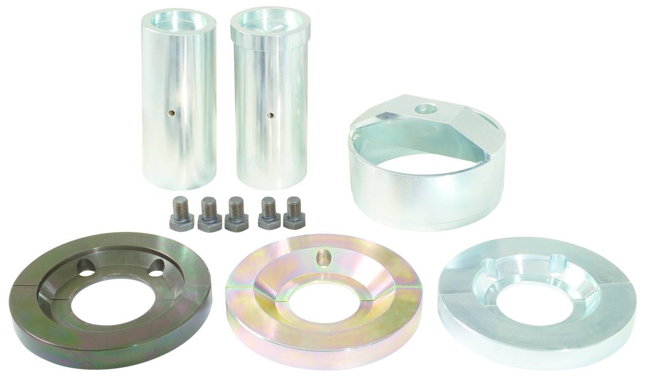 Ein Satz von Metallkomponenten, bestehend aus zwei zylindrischen Stützen, drei Scheiben, einer Hülse und vier Schrauben. Geeignet für mechanische Anwendungen.