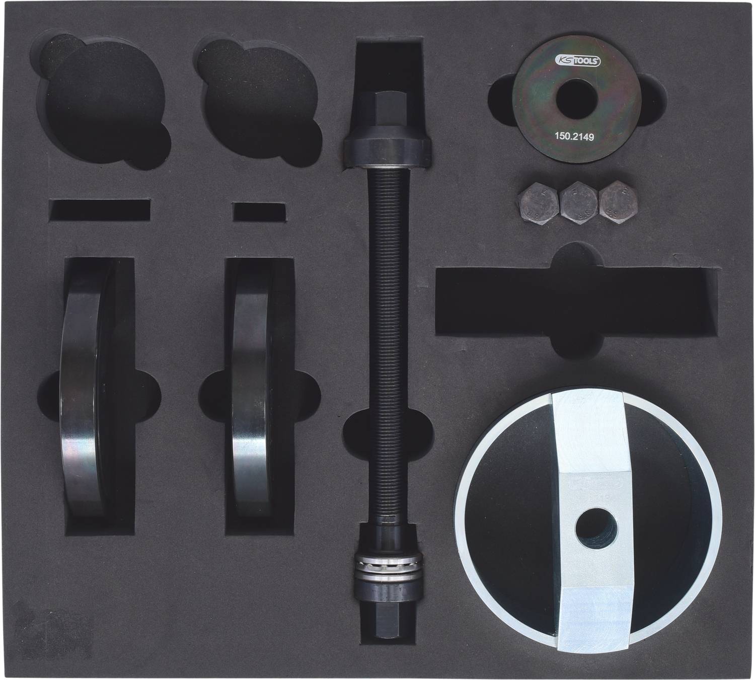 Werkzeugsatz in einer geformten Schaumstoffverpackung mit Schrauben, Muttern und Werkzeugen in verschiedenen Größen und Formen, geeignet für mechanische Arbeiten.