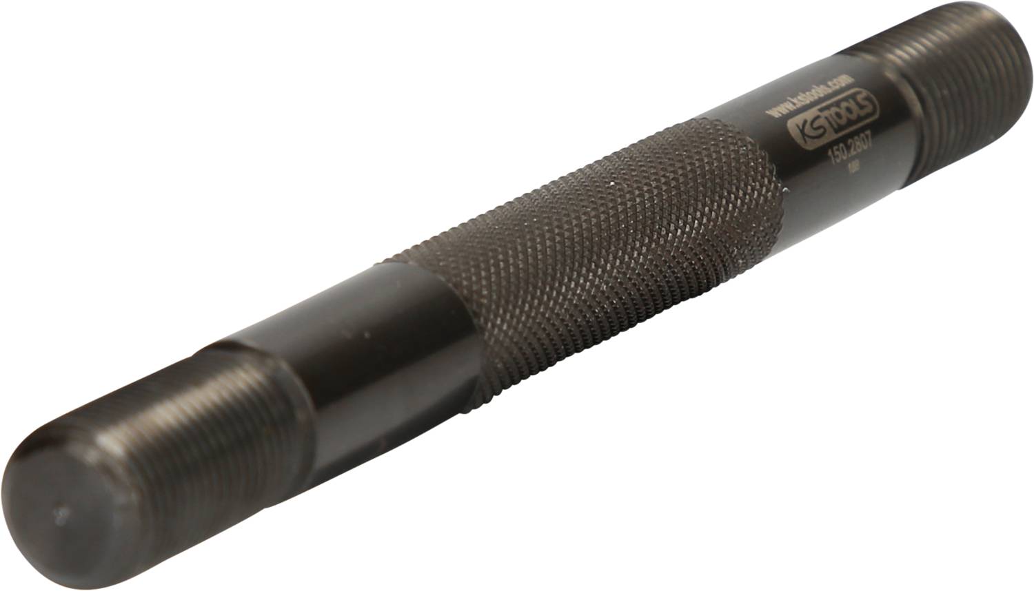 Ein verstellbarer Gewindebohrer mit gerändeltem Griff, verwendet zur Bearbeitung von Innengewinden in Werkstücken.