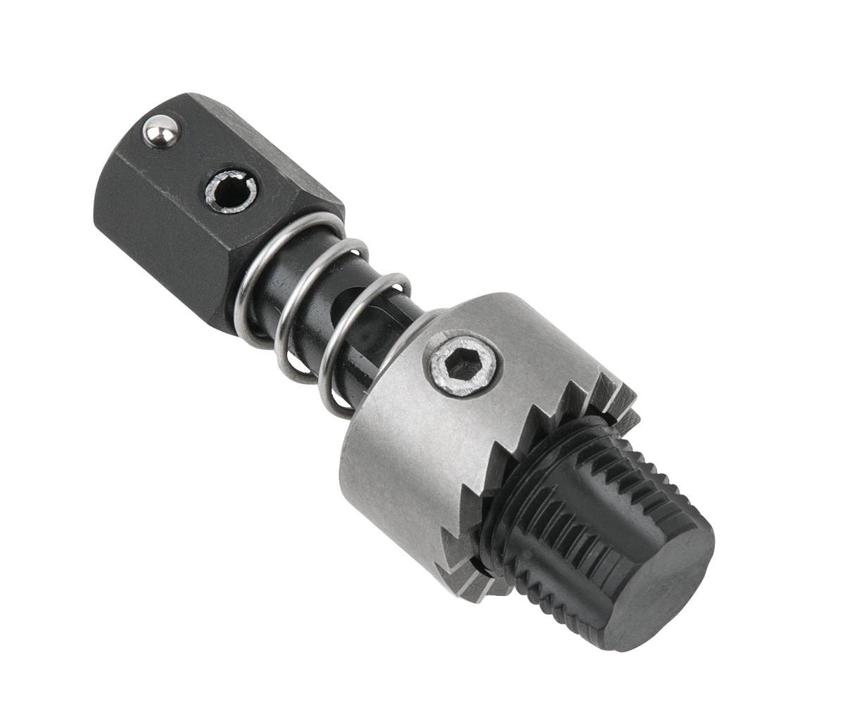 Ein silbernes und schwarzes mechanisches Bauteil mit gezacktem Rand, Feder und Einstellschraube.