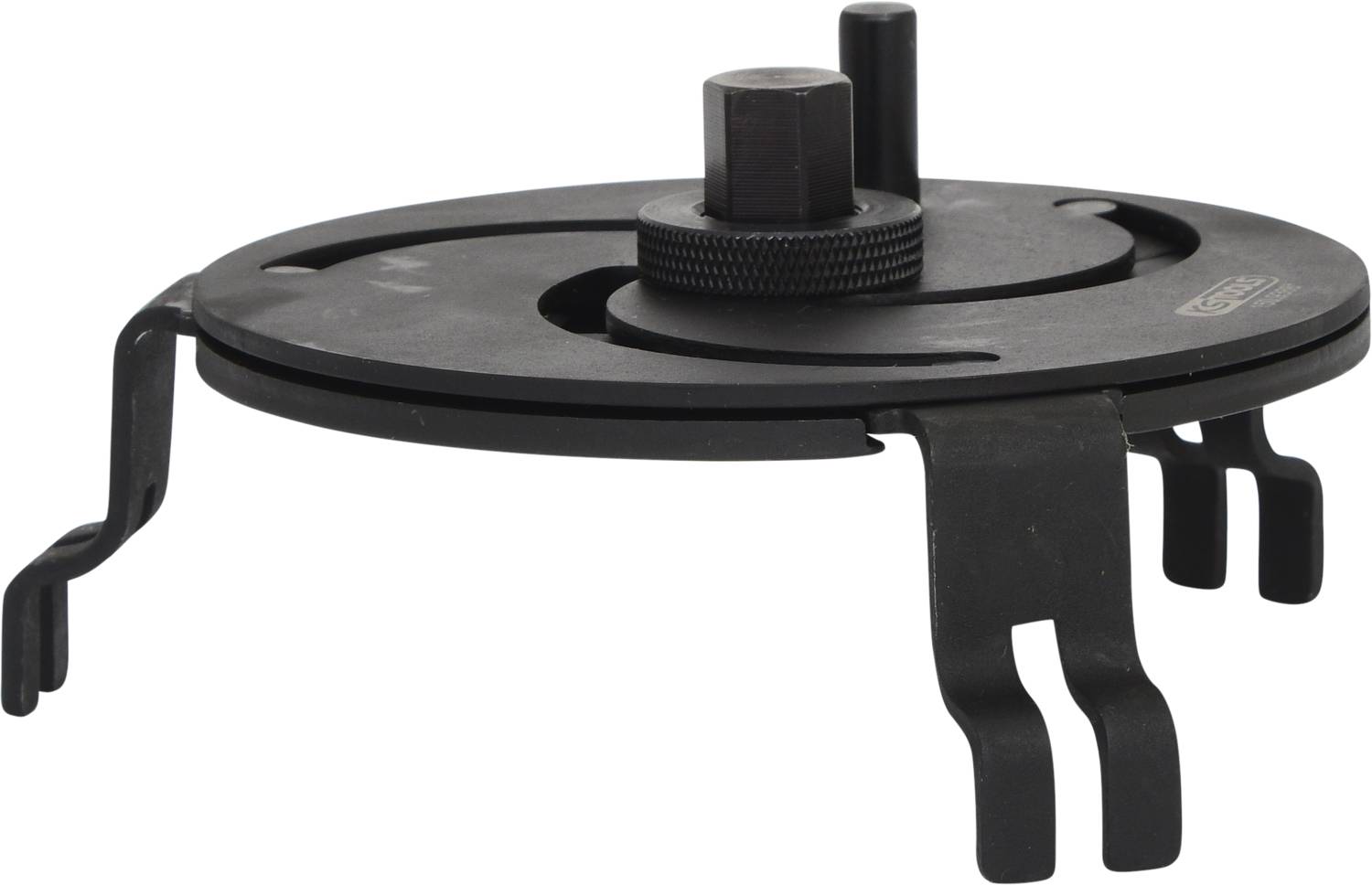 Ein schwarzes, rundes Metallwerkzeug mit Haken und einem zentralen Drehmechanismus. Es scheint für technische Anwendungen gedacht zu sein.