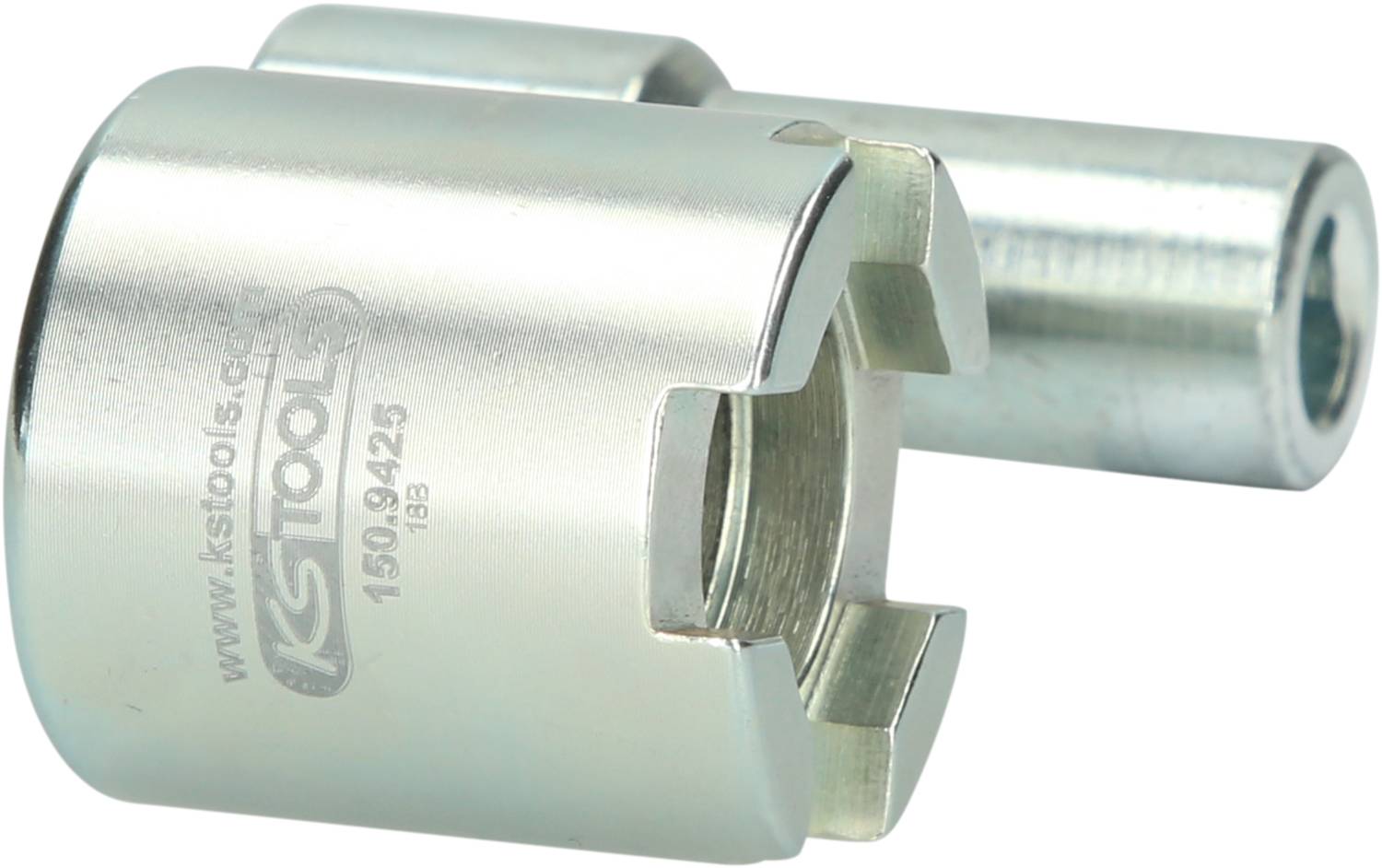 Metall-Werkzeug mit zylindrischer Form und Aussparungen an der Öffnung. Neben dem Werkzeug ist ein zylindrischer Stab zu sehen.