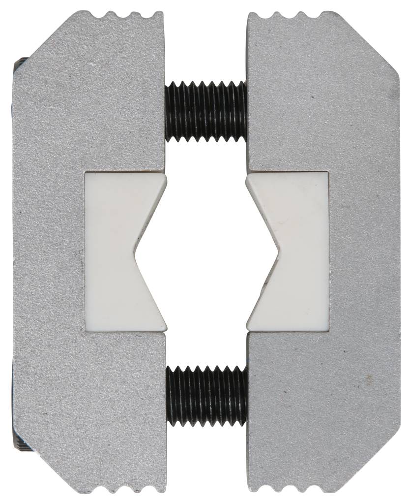 Zwei Metallplatten sind durch zwei schwarze Schrauben verbunden. In der Mitte befindet sich eine weiße, gezackte Einlage.