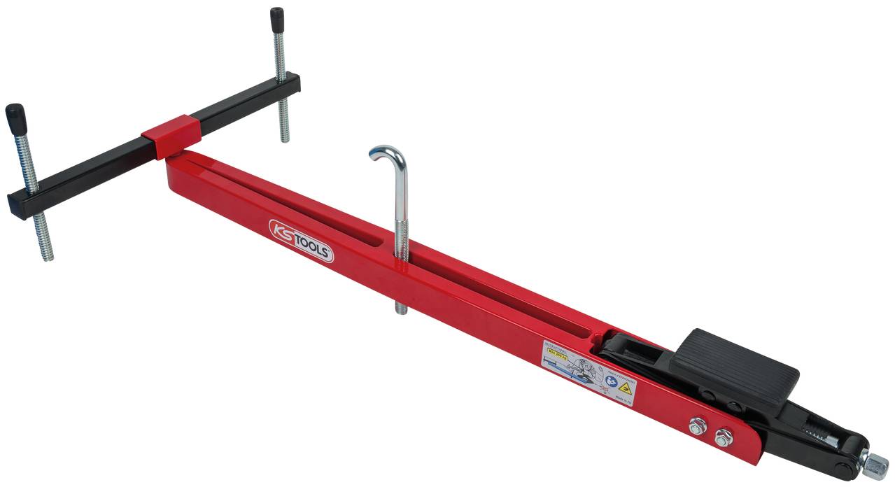 Rotes Motorhalterungswerkzeug mit verstellbaren Klemmen und Haken zur Sicherung von Motoren in einem Fahrzeug.