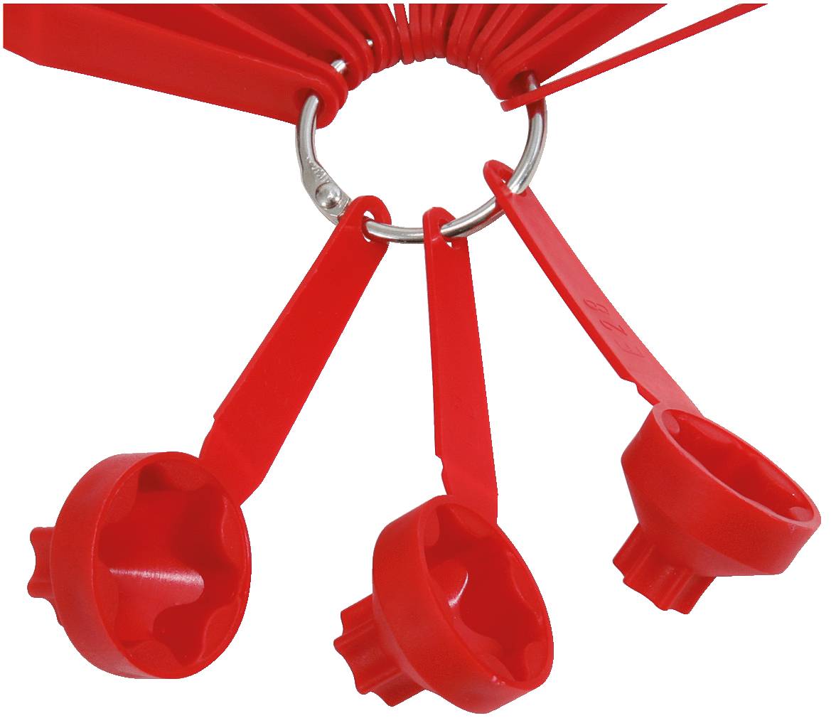 Roter Kunststoff-Messlöffel-Satz an Metallring, bestehend aus verschiedenen Löffelgrößen für präzises Abmessen von Zutaten in der Küche.