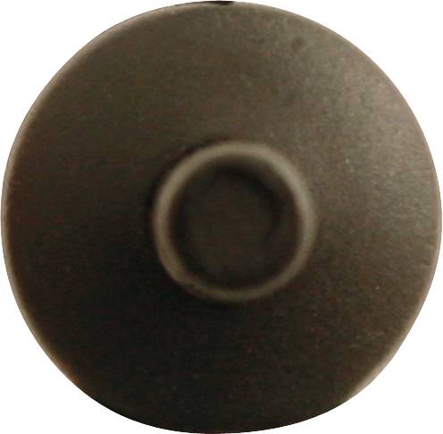 Ein schwarzer runder Knopf mit einem erhöhten mittleren Kreis.