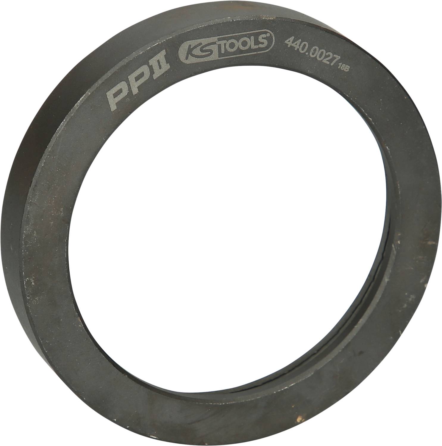 Ein schwarzer Metallring mit den Gravuren 'PP II', 'KS TOOLS' und der Nummer '440.0027' auf der Oberfläche.