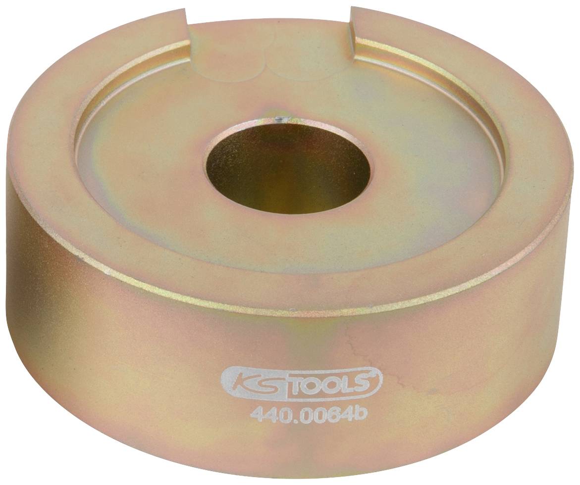 Ein rundes, metallisches Werkzeugteil mit einem zentralen Loch und einer Aussparung an der Oberseite. Aufschrift: 'KS Tools 440.0064b'.