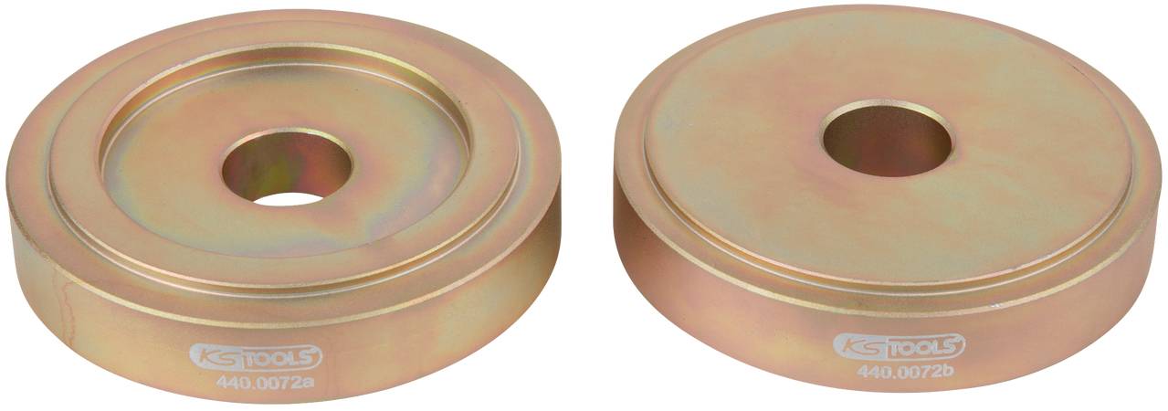 Zwei runde Metallunterlegscheiben mit Loch in der Mitte, gold glänzend, mit Aufschrift 'KS TOOLS'. Sie sind nebeneinander platziert.