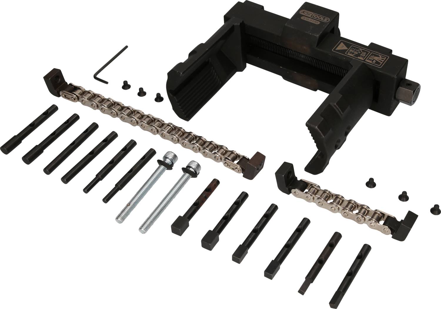 Ein Kettendrücker-Set mit verschiedenen Metallteilen und Werkzeugen zur Montage und Demontage von Kettengliedern.